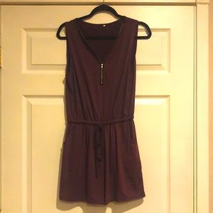 Short dark purple romper with zipper down